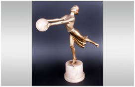 Art Deco Cold Painted Spelter Figure, Of A Dancing Girl With Arms Outstretched Holding A Beach Ball,