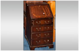 Reproduction Mahogany Inlaid Front Georgian Style Bureau with a fitted interior with brass snake