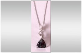 Russian Eudialyte and Diamond Pendant, a trillion cut of the natural grey/green, burgundy and