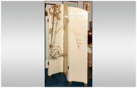 A Modern Chinese Lacquered Four Fold Screen decorated on an ivory ground featuring birds amongst