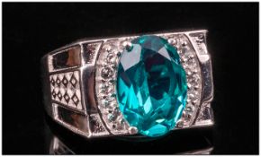 Blue/Green Quartz and White Topaz Ring, 5.25cts in a single, oval cut blue/green quartz edged