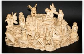 Resin Figure Group 'Faerie Story' Depicting 12 Loose Fairy Figures on a rocky base. Reads 'The World