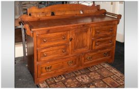 Large Picked Pine Sideboard with Shaped Splash Back and Shaped Rail Ends, with a Cupboard to the
