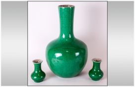 Chinese Green Glazed Crackle Ware Vases Large bottle shaped vase unmarked. Crackle glaze to the