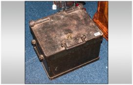 Iron Safe with key, of small size, with carrying handles to the sides. Probably from a bank vault.