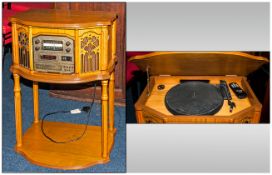 Reproduction Electric Record Player In a Bleached Oak Case With a Shaped Front Console Supported