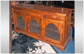 Contemporary Teak Sideboard of Large Size with three long drawers above three cupboards with Jali