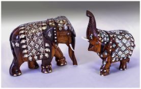 Indian Hand Carved Hardwood & Ivory Inlaid Decorative Elephant Figures, 2 in total. Circa 1930's.