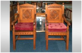 A Matched Pair Of Golden Oak Altar Chairs in the gothic style. Circa 1900. With carved backs with