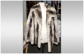 Ladies Fully Lined Chinchilla Jacket , Approximate size 12. slit pockets. Collar with revers