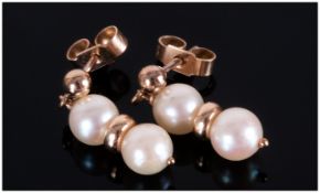 Pair of Ladies 9ct Gold and Pearl Drop Earrings. Marked 9ct.