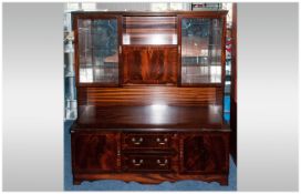 1930's Mock Jacobean Writing Table/Cabinet with a fitted interior, pigeon holes, supported on a 2