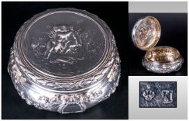 Victorian Ornate Silver Hinged Lidded Powder Bowl the cover decorated with raised images of Cherubs.