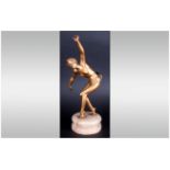 Art Deco Spelter Figure Of A Semi-Clad Dancing Girl. Circa 1930's Raised On A Circular Alabaster