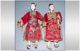 Pair of Chinese Wood and Gesso Dolls, lady and gentleman of wealth; each with roughly carved