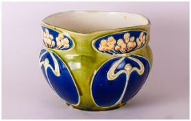 Art Nouveau Art Pottery Jardiniere. In the typical design of the period. With a stylised Ins. Marked