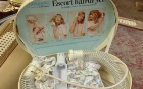 Escort Hairdryer 'Dry Hair with both hands free'.