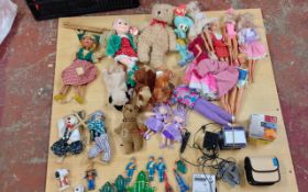 Assorted Collection of Dolls, Teddies and a Mini Disk Player with Discs.