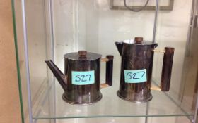 Pair of Plated Shell Case Teapots, with Ebony Handles.  Dated 1918 & 1943.