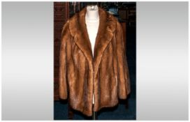 Ladies Light Brown Mink Coat, collar with revers, slit pockets & fully lined, Approximate Size 12.