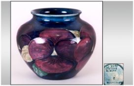 Moorcroft Pansy Decorated Vase, Blue Ground, Height 2¾ Inches, c1925.