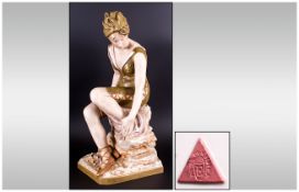 Royal Dux Large Figure of a Young Woman Seated on a Rock, an impressive, very fine and rare