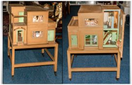 An Unusual Deco Style Dolls House circ 1930.s. Fitted inside with furniture of the period of high