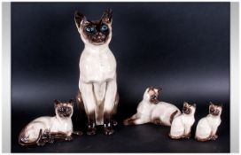 Beswick Siamese Cat Family comprising 5 figures. Designer Albert Hallam. Model 1887, 1897, 2139,