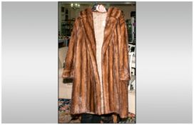 Ladies Full Length Light Brown Mink Coat, fully lined, collar with revers. Slit pockets. Half Back