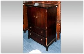 Stag Furniture. Mahogany High Boy Cupboard with two cupboards above two drawers below. 45 inches