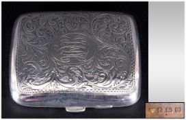 A Silver Engraved Cigarette Case Hallmark Birmingham 1912. 3.25x2.5''. 30zs. Good condition. No