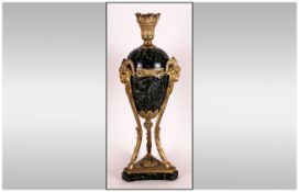 French Ormolu and Marble Vase of Classical Shape on three goat-shaped legs, with goat's head handles