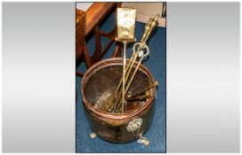 Large Brass And Copper Cauldron Shaped Coal Bucket, With Lion Mask Ring Handles And Paw Feet,