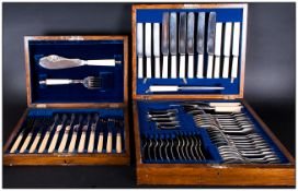 Two Wooden Cased Canteens Of Cutlery