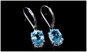 Sky Blue Topaz Pair of Drop Earrings, each one comprising a 2.25ct oval cut, bright, sky blue topaz,