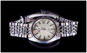 Seiko Gents Automatic Wristwatch, champagne dial, silvered battons and hands, with date aperture,