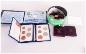 Tin of Assorted British Coins, copper and silver, Together with two cased 1951 coins, two sets of