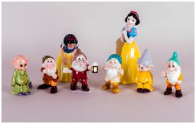 Disney Handpainted Ceramic Figures, Snow White & 6 Dwarfs. 8 in total. All figures are in