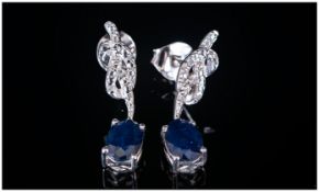 Blue Sapphire Drop Earrings, Solitaire oval cut sapphires totalling 1.5cts suspended below platinum