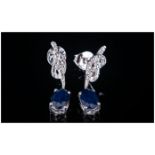 Blue Sapphire Drop Earrings, Solitaire oval cut sapphires totalling 1.5cts suspended below platinum