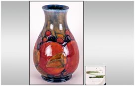 William Moorcroft Signed Vase ' Pomegranates and Berries Design. c.1930's. Stands 4.75 Inches.