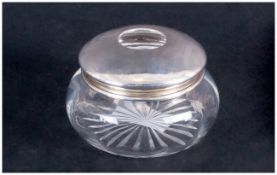 A Silver Topped Cut Glass Jar Hallmark Birmingham 1920. 2.5'' in height.