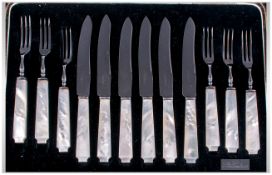 Boxed Set of Dessert Knives and Forks, mother of pearl handles.