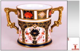 Royal Crown Derby Imari Two Handled Cup, Pattern Num.1128. Date 1970. Height 3.25 Inches.