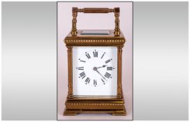 Japy Freres French Quality Brass 8 Day Striking Carriage Clock with white porcelain dial, black