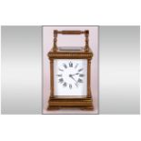 Japy Freres French Quality Brass 8 Day Striking Carriage Clock with white porcelain dial, black