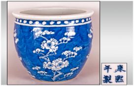 Chinese Late 19th Century Blue and White Jardiniere, Decorated with Images of Prunus Flowers. Four
