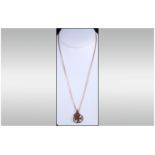 A 9ct Gold Pendant and Chain, Marked 375 + a 9ct Gold St. Christopher. 5.3 grams.