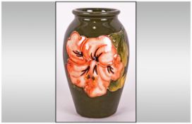 Moorcroft Small Vase ' Coral Hibiscus ' Design on Green Ground. 4 Inches High, Excellent Condition.