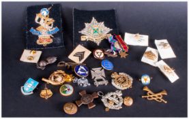 A Collection Of British World War 1 & 2 Military Cap Badges, medals & buttons. Various regiments.